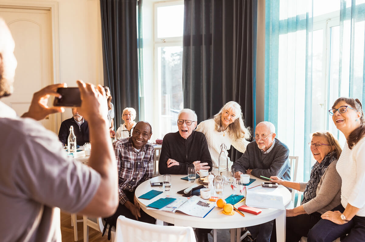 Group of seniors smiling for a picture.